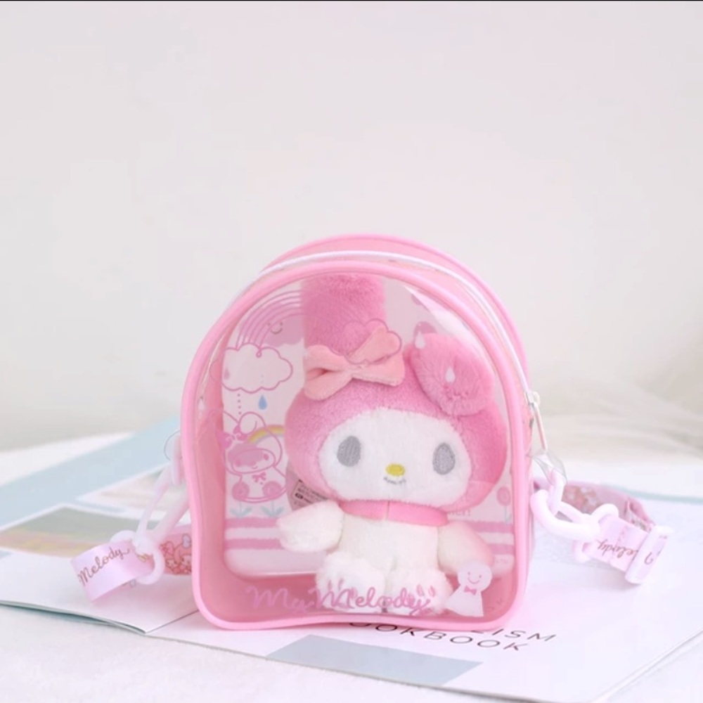 My melody clear backpack with plushie in it